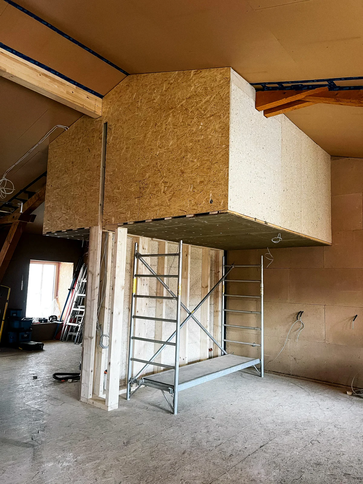 Suspended mezzanine during construction